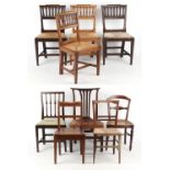 Property of a gentleman of title - a set of four 19th century fruitwood side chairs with rush drop-