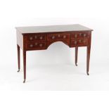 Property of a gentleman - an early 19th century & later inlaid kneehole writing table, with green