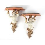 Property of a lady - a pair of late 19th / early 20th century carved & painted giltwood cherub small