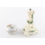 Property of a gentleman - a Victorian porcelain lamp base modelled as a kneeling putto, possibly