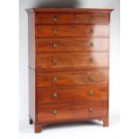 An early 19th century Regency period mahogany tallboy or chest-on-chest, with original brass leopard