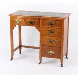 Property of a deceased estate - a small Edwardian oak single pedestal desk with green leather