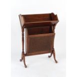 Property of a lady - an early 20th century oak & cane panelled vide poche magazine rack, stamped '