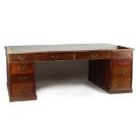 Property of a firm of solicitors - a very large Edwardian mahogany partners desk, with inset top