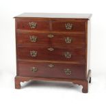 A George III mahogany chest of two short & three long graduated drawers, on bracket feet, 35.