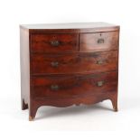 Property of a gentleman of title - an early 19th century mahogany bow-fronted chest of two short &