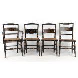 Property of a lady - a set of four 19th century black painted & rush seated chairs including one