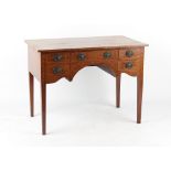 Property of a gentleman of title - an Edwardian mahogany & inlaid kneehole table, split to top,