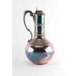 Property of a deceased estate - a late Victorian Arts & Crafts silver plated ewer with hinged lid,