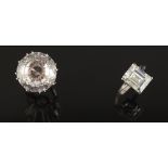 Property of a lady - an 18ct white gold single stone ring, set with an emerald cut diamond simulant,