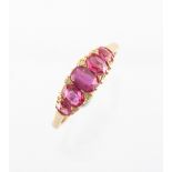 A yellow gold certificated unheated Burmese ruby five stone ring, the five cushion cut rubies