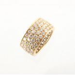 Van Cleef & Arpels - an 18ct yellow gold diamond eternity ring by Van Cleef & Arpels, the