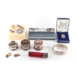 Property of a gentleman - a bag containing assorted items including an Edwardian silver flip top red