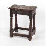 Property of a lady - a 17th century oak joint stool, 17ins. (43cms.) long.