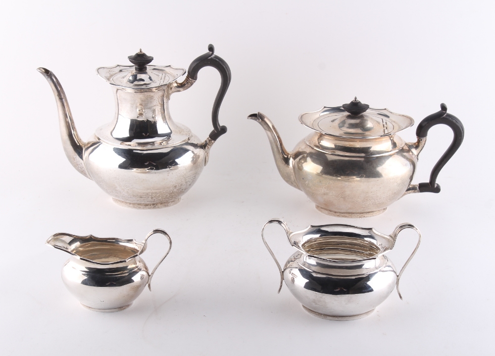 Property of a gentleman - an early 20th century silver four piece tea set, lightly engraved