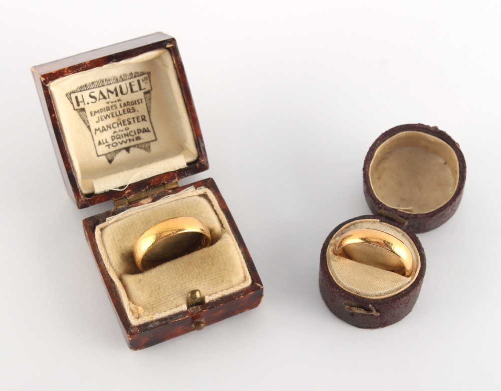 Property of a deceased estate - two plain 22ct yellow gold wedding bands or wedding rings,