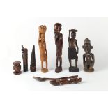 Property of a deceased estate - a box containing carved wood tribal figures, etc..