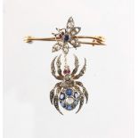 An unusual 9ct yellow gold gem set spider & fly brooch, set with rose cut diamonds, round cut