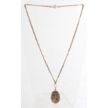 Property of a lady - a 9ct gold oval locket on 9ct gold chain necklace, approximately 10.6 grams