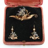 A very unusual yellow gold gem set brooch & earrings suite, circa 1870, each modelled as a dragonfly