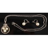 Property of a lady - a 14ct white gold pearl pendant on 18ct white gold chain necklace, the chain