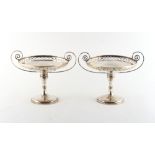 Property of a deceased estate - a pair of silver early 20th century silver two handled pedestal