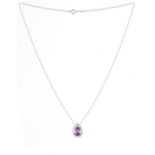 An amethyst & diamond pendant on platinum chain necklace, the cut pear shaped amethyst weighing