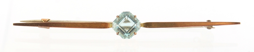 Property of a lady - an early 20th century 9ct yellow gold bar brooch set with an octagonal cut