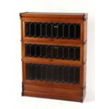 Property of a deceased estate - a Globe Wernicke oak & leaded glass three section stacking bookcase,