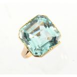 A 9ct yellow gold large aquamarine ring, the octagonal cut aquamarine weighing approximately 14.38