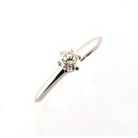 Tiffany - a platinum diamond single stone ring by Tiffany, the round brilliant cut diamond