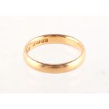 Property of a deceased estate - a 22ct gold wedding band ring, size O, approximately 4.6 grams.