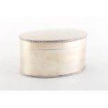 Property of a lady - an early 20th century silver biscuit box, of oval form with Greek key