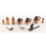 Property of a lady - two miniature cold painted bronze models of animals; together with a white