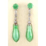 A pair of jadeite & diamond pendant earrings, for pierced ears, each with a jadeite handle form drop