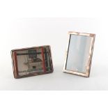 Property of a deceased estate - two modern silver framed easel photograph frames, the taller 6.7ins.