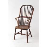 Property of a deceased estate - a 19th century elm seated spindle back Windsor elbow chair with