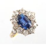 A fine 18ct yellow gold certificated unheated Burmese sapphire & diamond oval cluster ring, the