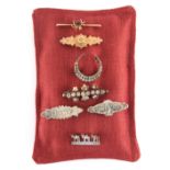 Property of a lady - a collection of seven brooches, late 19th and early 20th century, including a