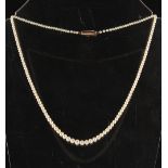 A certificated natural saltwater pearl graduated single strand necklace, the one hundred & fifty-