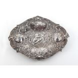 Property of a lady - a late Victorian silver lozenge shaped dish, with repousse vignettes