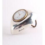 Property of a gentleman - an Edwardian silver heart shaped boudoir clock or desk clock, the engine