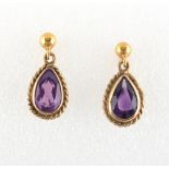 Property of a deceased estate - a pair of 9ct gold pear shaped cut amethyst drop earrings, for