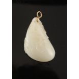 Property of a lady - a Chinese white jade pebble pendant carved in the form of a gourd with a