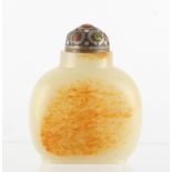 Property of a lady - a Chinese pale celadon jade snuff bottle of flattened ovoid form with