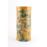 Property of a lady - a large Chinese sancai glazed brush pot, bitong, decorated in relief with two