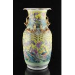 Property of a lady - a 19th century Chinese Canton famille rose vase painted with phoenix & other