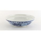 Property of a lady - a Chinese blue & white ogee shaped dish or shallow bowl, underglaze blue