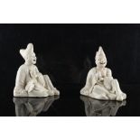 Property of a gentleman - a pair of 19th century Japanese Hirado type seated figures, with moving