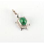 A small 18ct white gold emerald & diamond tortoise pendant, approximately 25mm long including